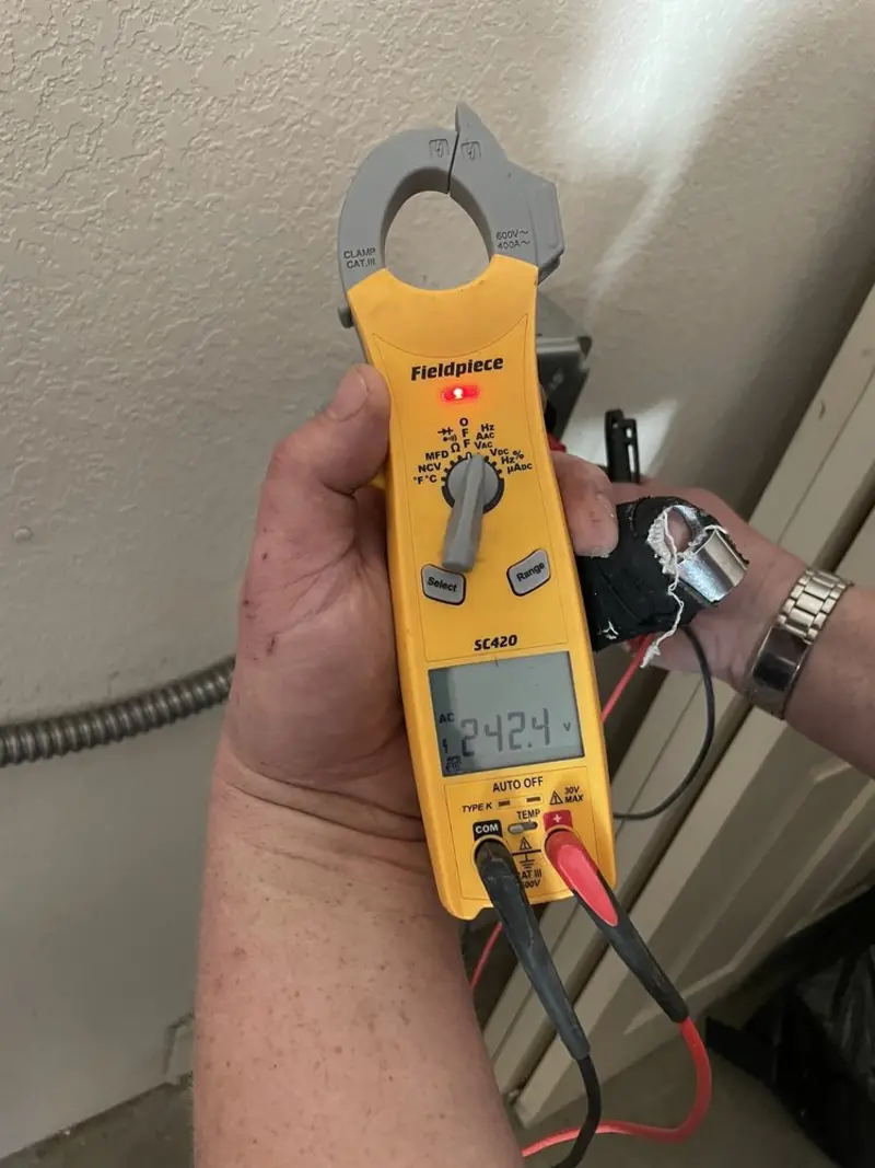 Voltage testing with clamp meter during Generator Installation in Robbinsdale